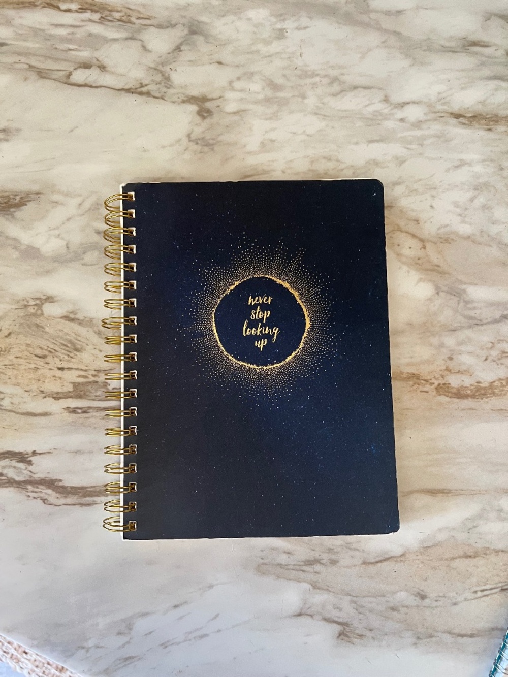 Never stop looking up front logo spiral nite book navy gold
